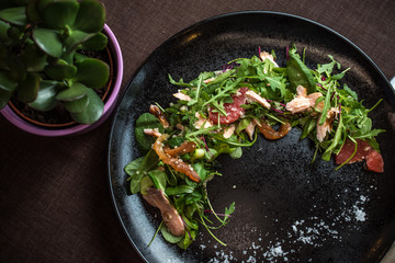 Chicken and green lettuce and leaf salad