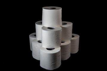 toilet paper isolated on black