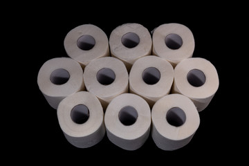 toilet paper isolated on black