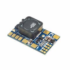 Green round led pulse width modulation dimmer PCB board surface mount components in a close-up side...