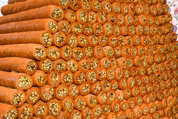 Various types or many colorful assortment of Turkish delights rolls for sale in a shop in Istanbul