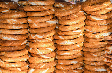 Simit is a Turkish loop-shaped bread, encrusted with sesame seeds, Cracknel and Gevrek