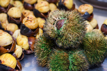 Roasting chestnuts on a street stall in Istanbul, Turkey. Selective focus.