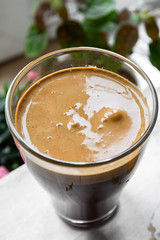 cup of coffee  with foam close up