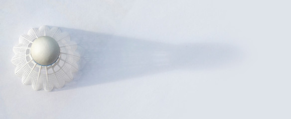 plastic  Badminton shuttlecock. Macro of a plastic  shuttlecock isolated on the white background. Design of a shuttlecock. Badminton accessories. Sports equipment. 