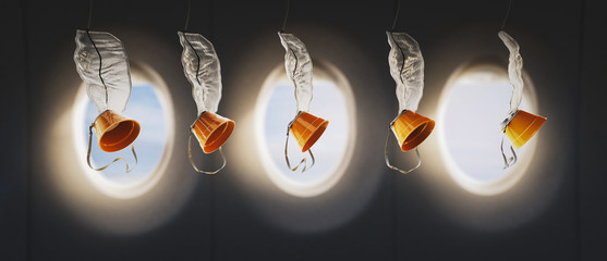 3D illustration of oxygen masks inside an airplane © fergregory