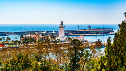 Fototapeta na wymiar The lighthouse of Malaga port