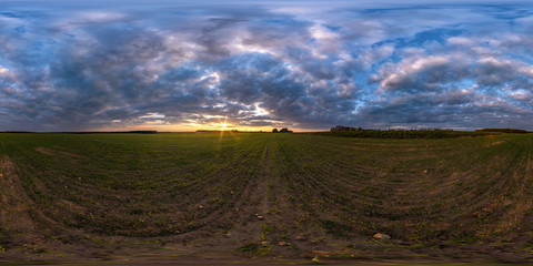 full seamless spherical hdri panorama 360 degrees angle view among fields in summer evening sunset with awesome blue pink red clouds in equirectangular projection, ready for VR AR virtual reality