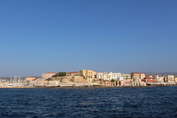 Fototapeta na wymiar A view of old Venetian Harbor of Chania with historical buildings in Crete Island, Greece.