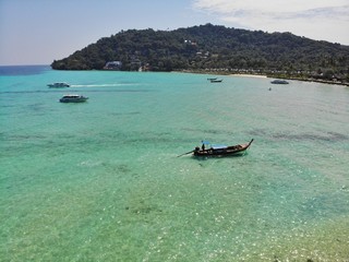 Thailand, Koh Phi Phi, with turquoise water and stunning beaches, is a paradise everyone should visit once in a lifetime. It's definitely worth it! 