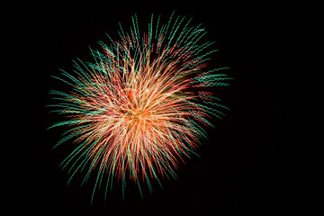 Fototapeta premium Beautiful fireworks that color the dark night sky
