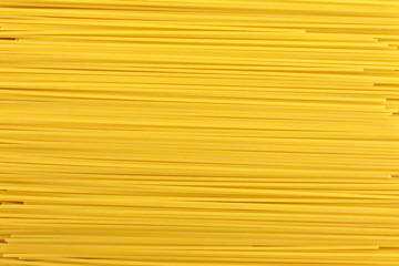 Spaghetti - yellow pasta, ready for cooking. isolated on the white background. uncooked spaghetti noodles. Uncooked whole wheat pasta. 