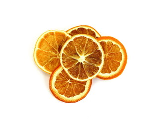 Dried orange slices from above on white background 