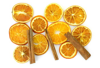 Fototapeta na wymiar Dried orange slices from above on white background 