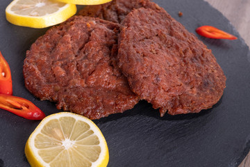 Grilled rib-eye beef steak, herbs and spices. Top view