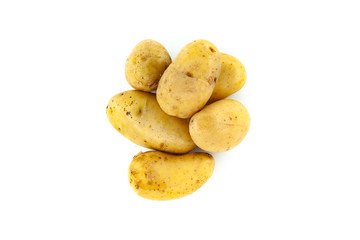 Young potatoes isolated on white background. Harvest new.  Top view of potatoes.