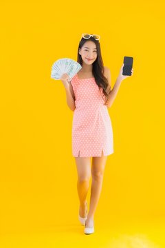 Portrait Beautiful Young Asian Woman Show A Lot Of Cash And Money With Mobile Smart Phone