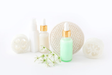 Fototapeta na wymiar Natural cosmetic skincare bottle containers on white background. Natural beauty