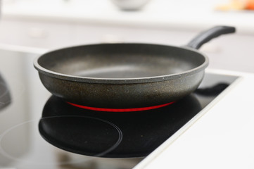 the pan is on the included electric stove