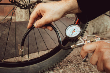 The pressure gauge of the compressor. Shows the air pressure being pumped into the Bicycle...