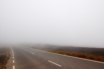 road with thick fog and overhead space