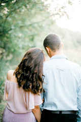 Fototapeta premium Romance. Couple in love. The girl bowed her head on the shoulder of her beloved. Date. Love. Relationship.