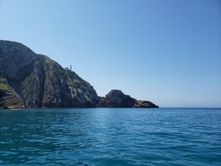 Naklejka premium Alto mar em Arraial do Cabo no Rio de Janeiro, céu azul e seascapes
