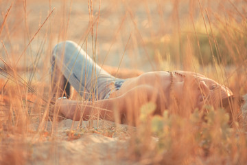 Nice musclar boy posing in the beach