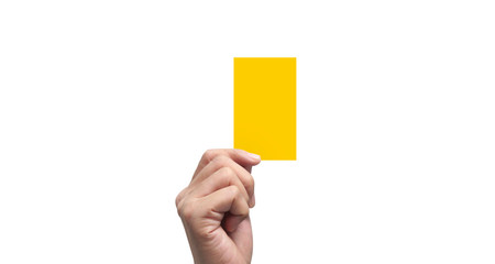 Referee hand holding yellow cards. isolated