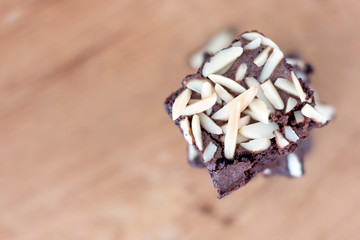 Homemade chocolate brownies with almond on top