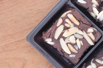 Homemade chocolate brownies with almond on top