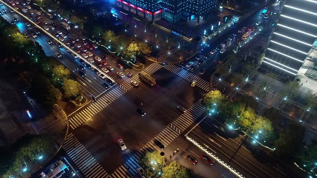 Night view of Chinese city, top view of traffic at crossroad
