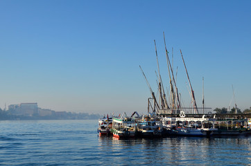 Fishing boat moored against a beautiful sky.