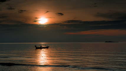 Boats at achor in the Gulf of Thailand at sunset