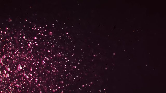 Video of underwater colorful bubbles rising to surface in slow motion 180fps. Close up, refreshing soda tonic fizzy water, bubbles dissolve in mineral carbonated drink. Bubbles particles rise up.