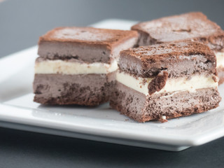 Homemade chocolate ice cream sandwiches cut into bite sized pieces