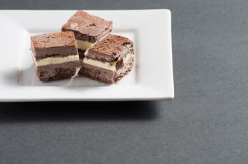 Homemade chocolate ice cream sandwiches cut into bite sized pieces