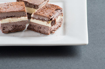 Homemade chocolate ice cream sandwiches cut into bite sized pieces