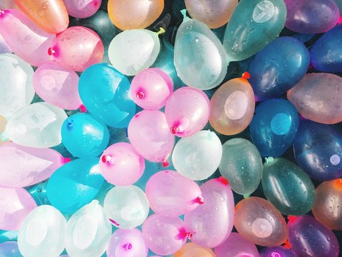 Full Frame Shot Of Multi Colored Wet Balloons