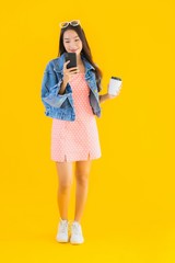 Portrait beautiful young asian woman with coffee cup and smart mobile phone