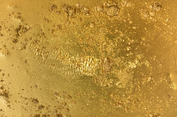 Fototapeta na wymiar Golden dust background. Sparkling gold texture.