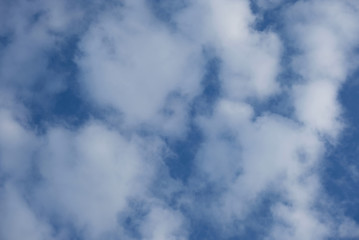 blue sky and fluffy clouds