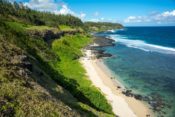 Beautiful view of the Mauritian landscape. Mountains, ocean and picturesque clouds