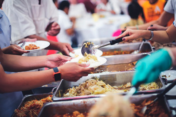 Concept of free food serving : Starvation issues help with food donations