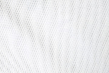 Plakat White mesh jersey fabric background. cloth sport wear texture for exercise. light weight, good air flow, cool and easy to dry from sweat. abstract wallpaper with copy space for text.