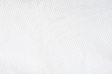 White mesh jersey fabric background. cloth sport wear texture for exercise. light weight, good air flow, cool and easy to dry from sweat. abstract wallpaper with copy space for text.