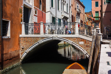 A small bridge thrown over the canal in Venice, Italy