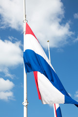 Flag of the Netherlands in red, white and blue.