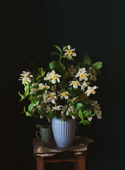 A bouquet of flowers in a vase on the table