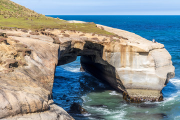 Sandstone cliffs  at Tunnel beach in New Zealand